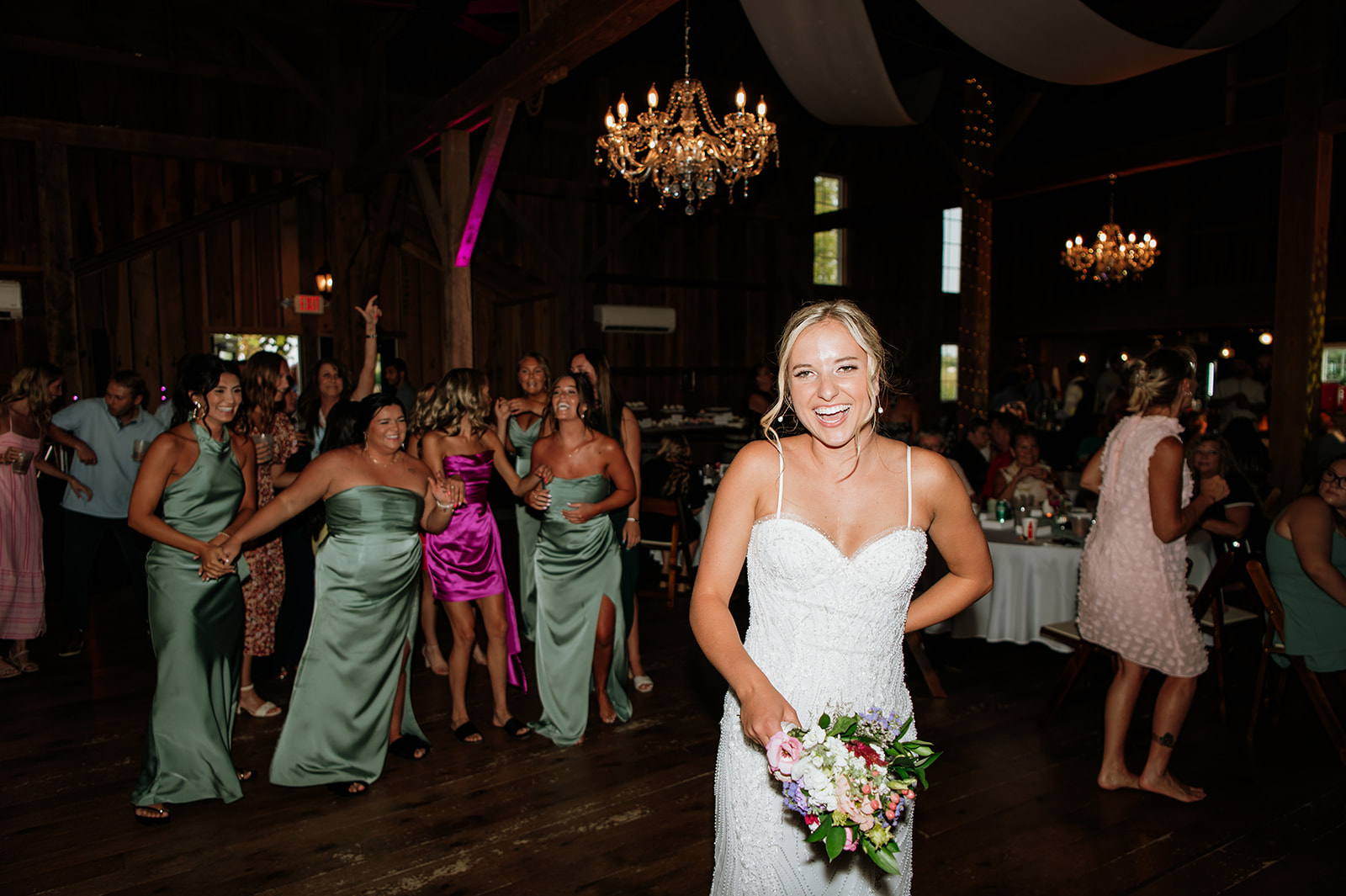 Bride about to throw her wedding bouquet