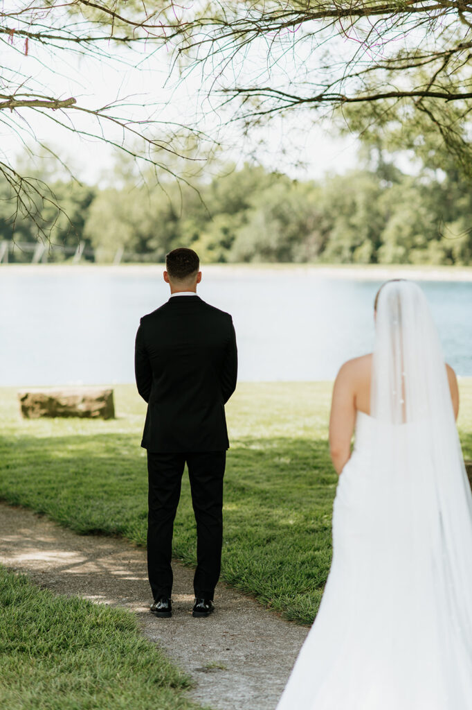 Bride and groom about to share a first look at The Clubhouse Venue in Huntington, Indiana