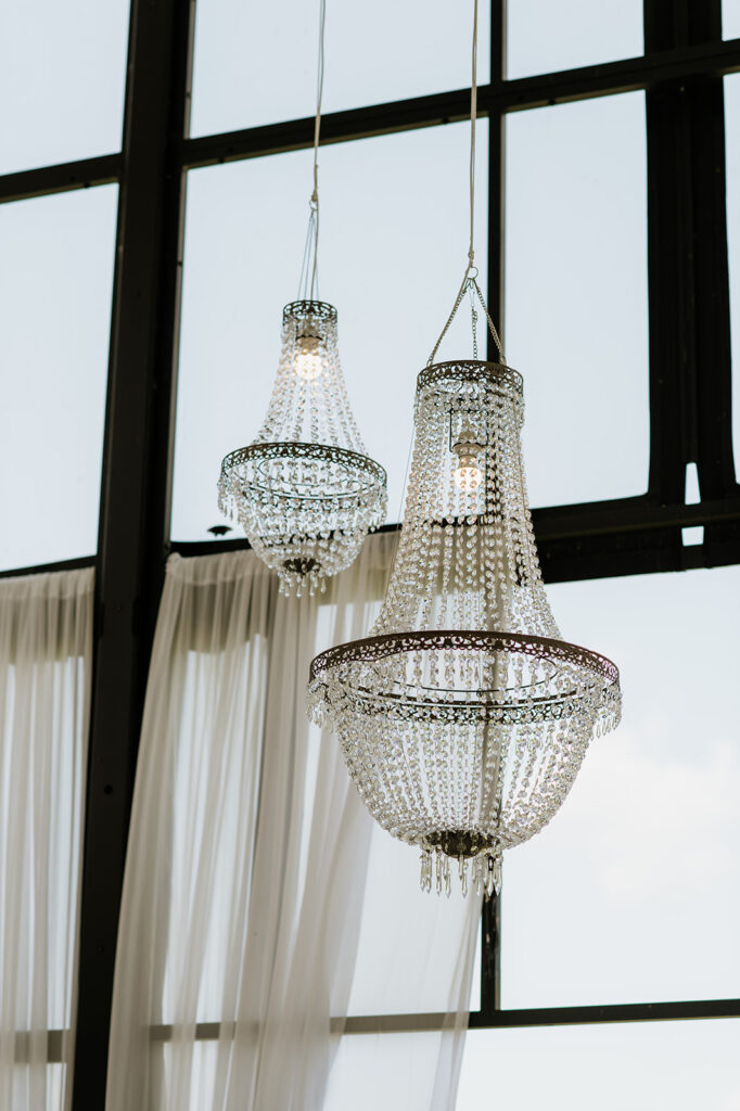 Two hanging chandeliers at The Clubhouse Venue