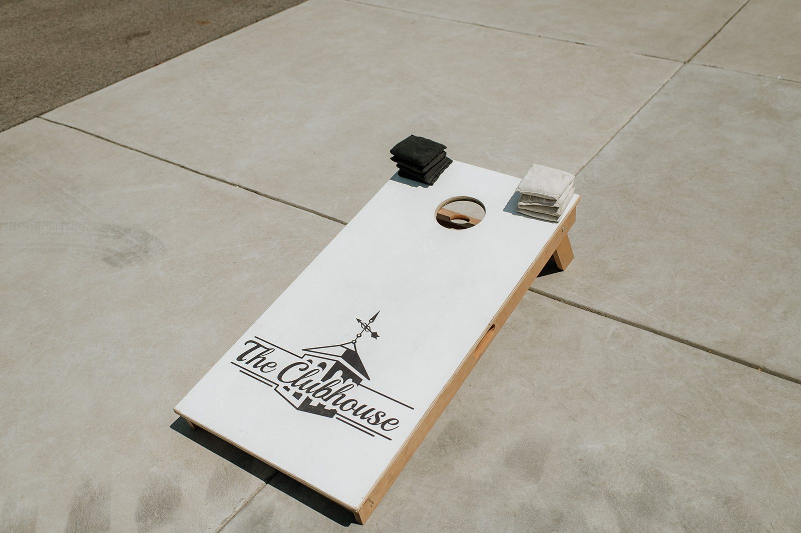 Cornhole game at The Clubhouse venue in Huntington, Indiana