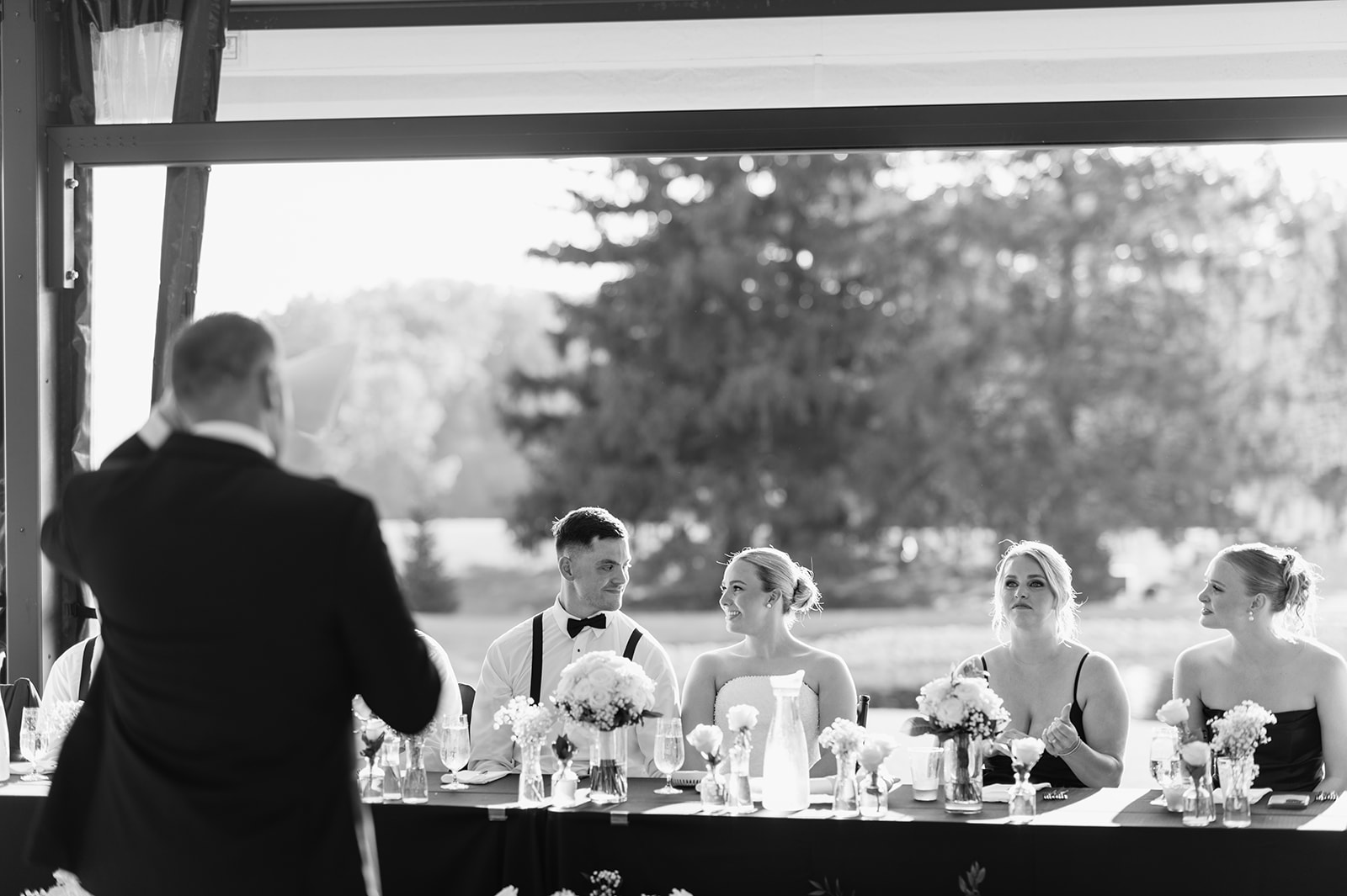 Wedding speeches during sunset inside The Clubhouse Venue atrium.