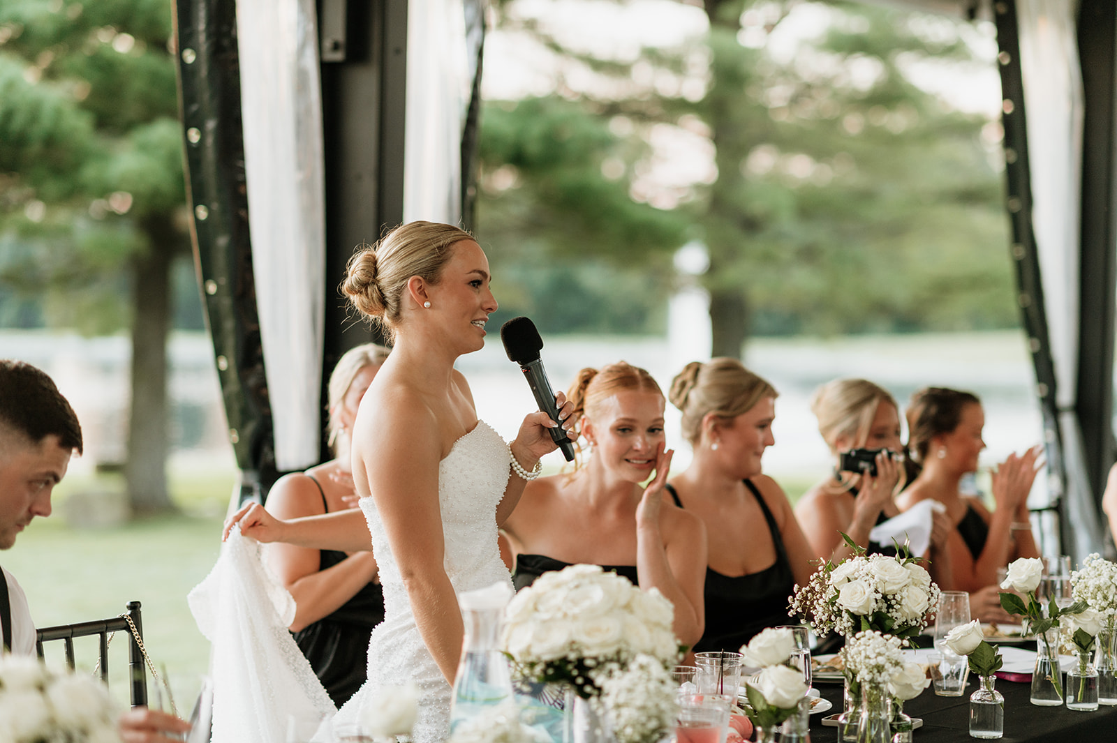 Bride giving a speech during her reception