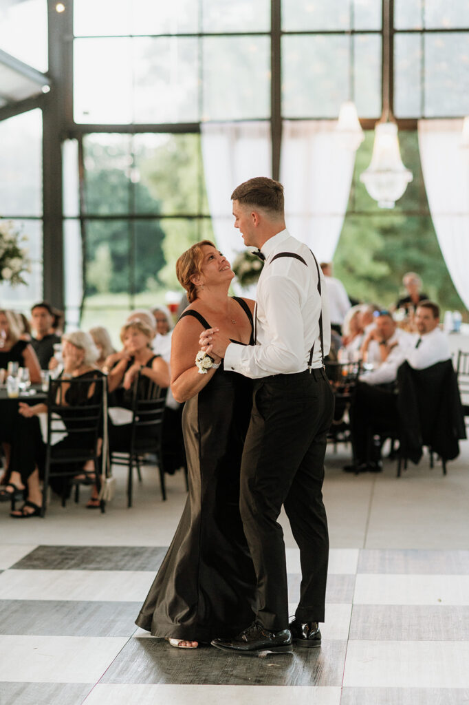 Groom sharing a first dance with his mother