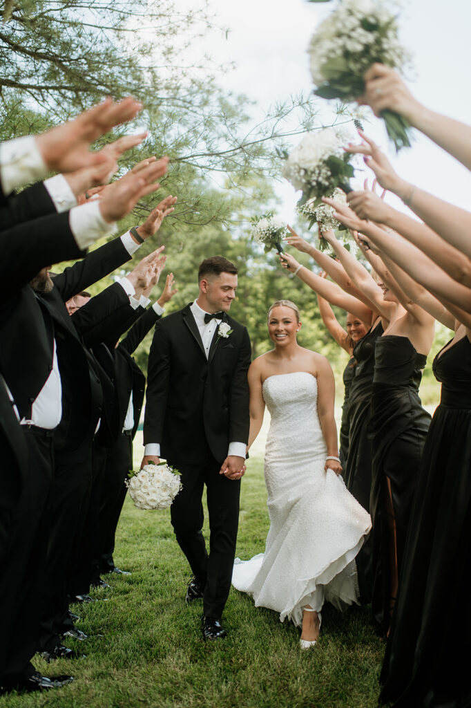 Bride and grooms outdoor wedding party photos from a Clubhouse venue wedding in Huntington, Indiana
