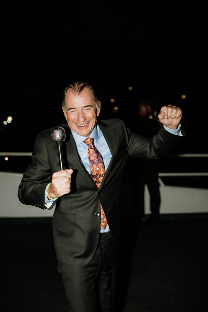 Guest dancing on the Anita Dee II during a Chicago yacht wedding reception.