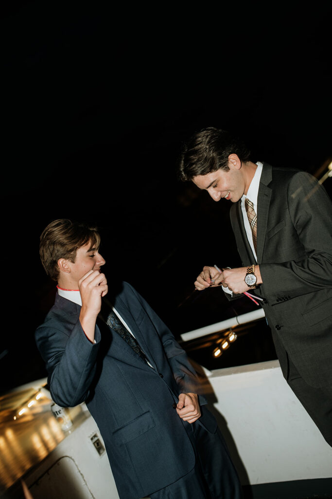 Guests having fun on the Anita Dee II during a Chicago yacht wedding reception.