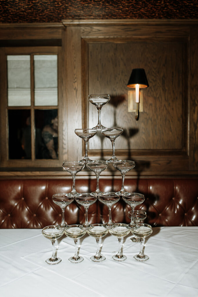 Champagne tower display set up for a Tortoise Supper Club wedding before the Chicago yacht after-party.