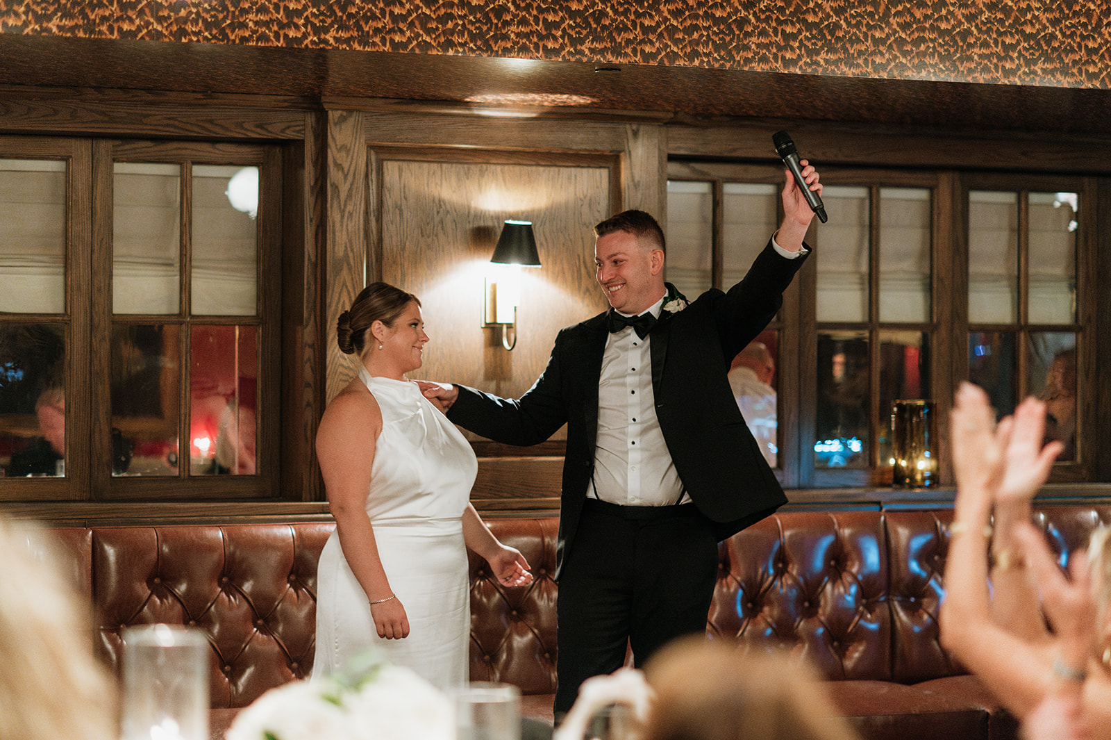 Bride and groom giving a speech during their cocktail hour.