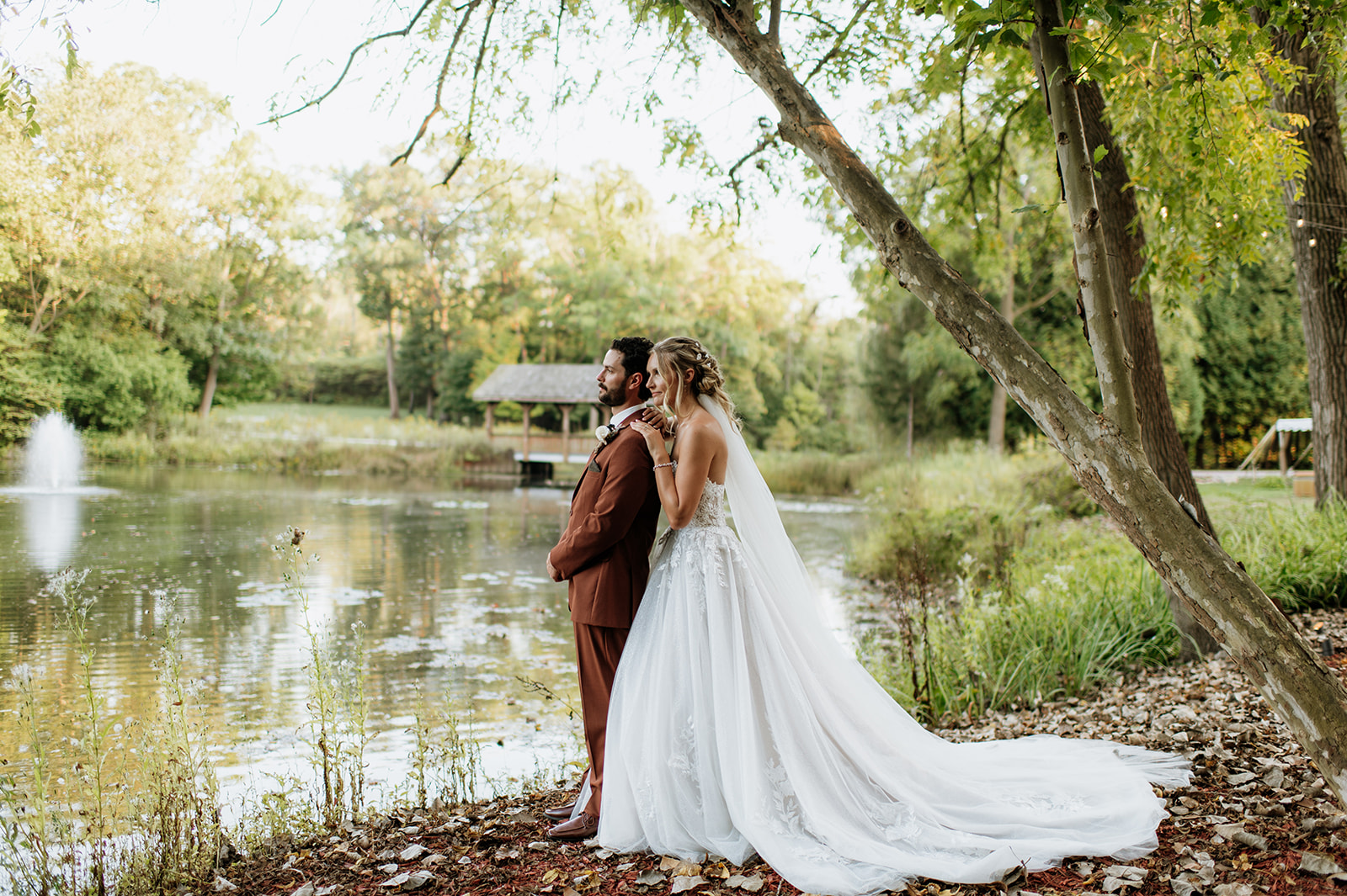 Bride and grooms outdoor portraits by Lake Liz at The Lodge at Rush Lakes in La Porte, IN.