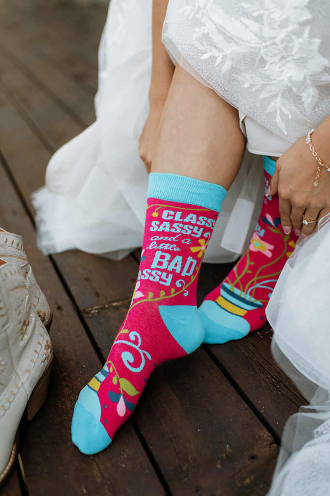 Bride showing off her colorful socks. 