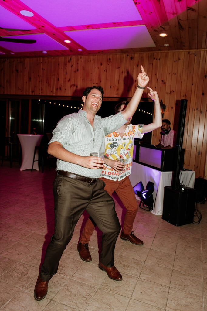 Guests dancing during a reception at The Lodge at Rush Lakes.