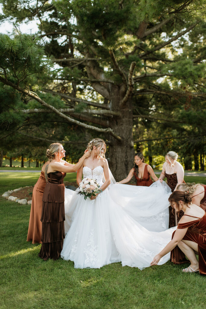 Outdoor bride and bridesmaids portraits at The Lodge at Rush Lakes in Indiana. 