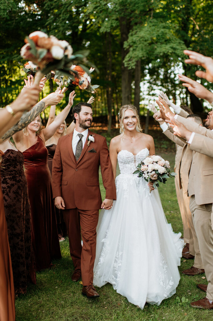 Outdoor wedding party photo at The Lodge at Rush Lakes.