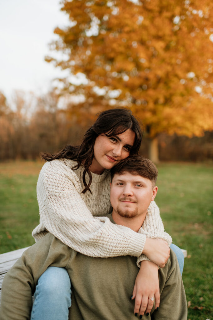 Couple posing for their fall engagement photos in Northern Indiana.