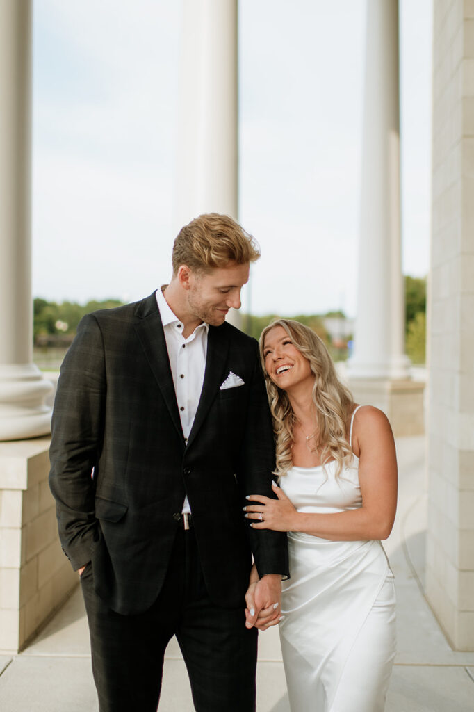 Man and woman laughing during their Goshen, Indiana engagement session.