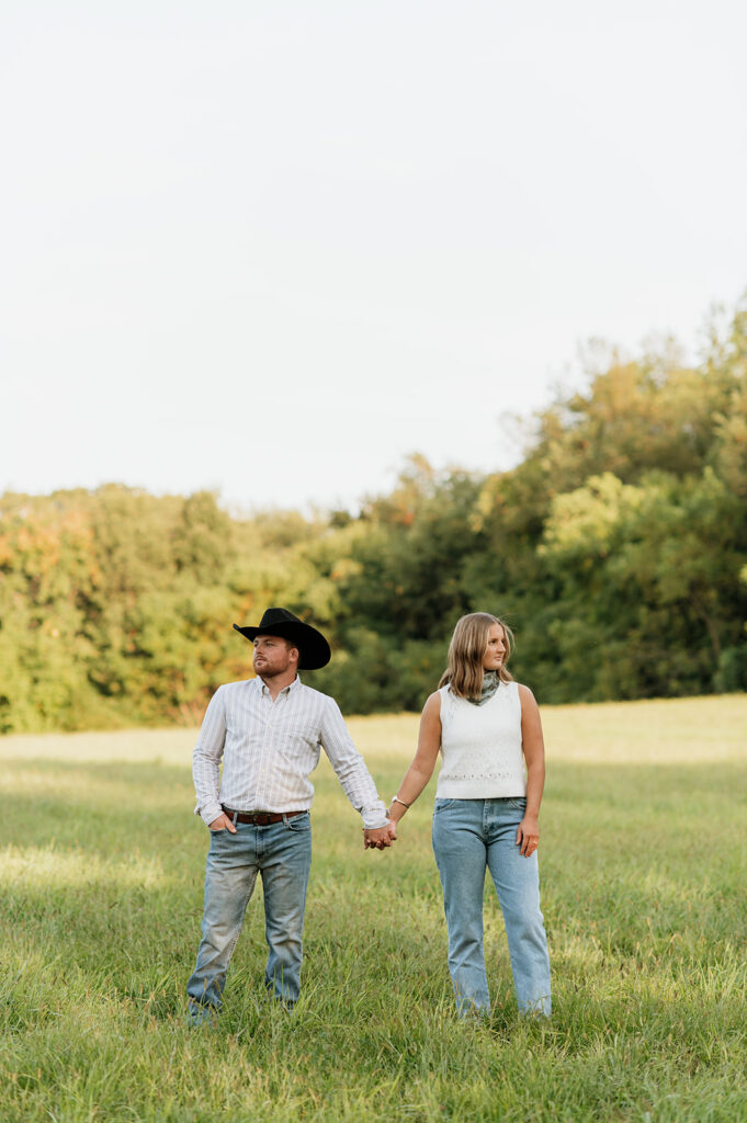 Couple posing for their western engagement photos in Indiana.