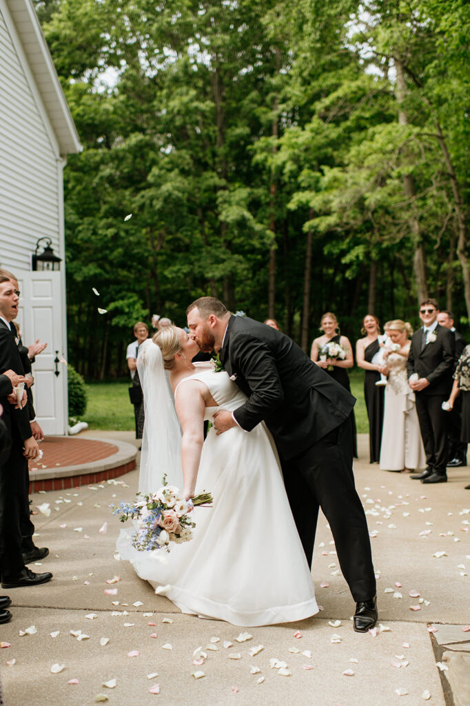 Bride and groom kissing outside of The Chapel at The Morris Estate in Niles, Michigan.