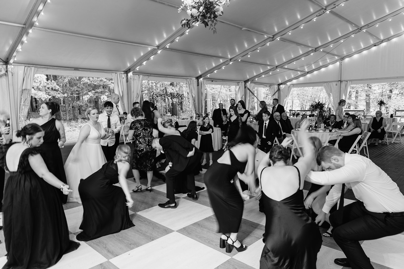 Black and white photos of guests dancing during a Morris Estate wedding reception.
