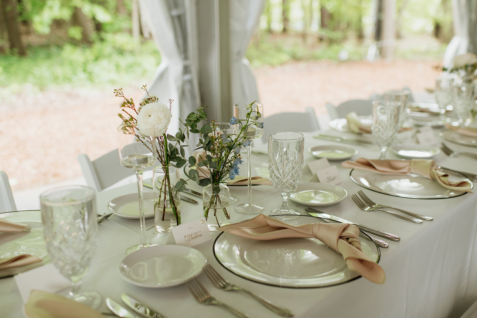 Close up wedding reception detail shot of a tablescape.